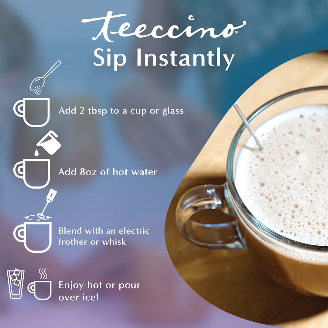 A single Monstera leaf in a clear glass vase against a white background.