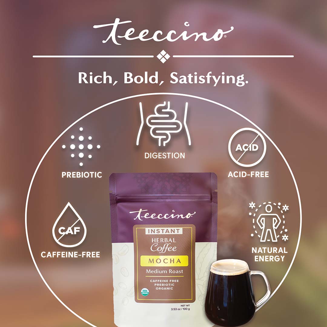 A single green leaf in a clear glass of water on white background.