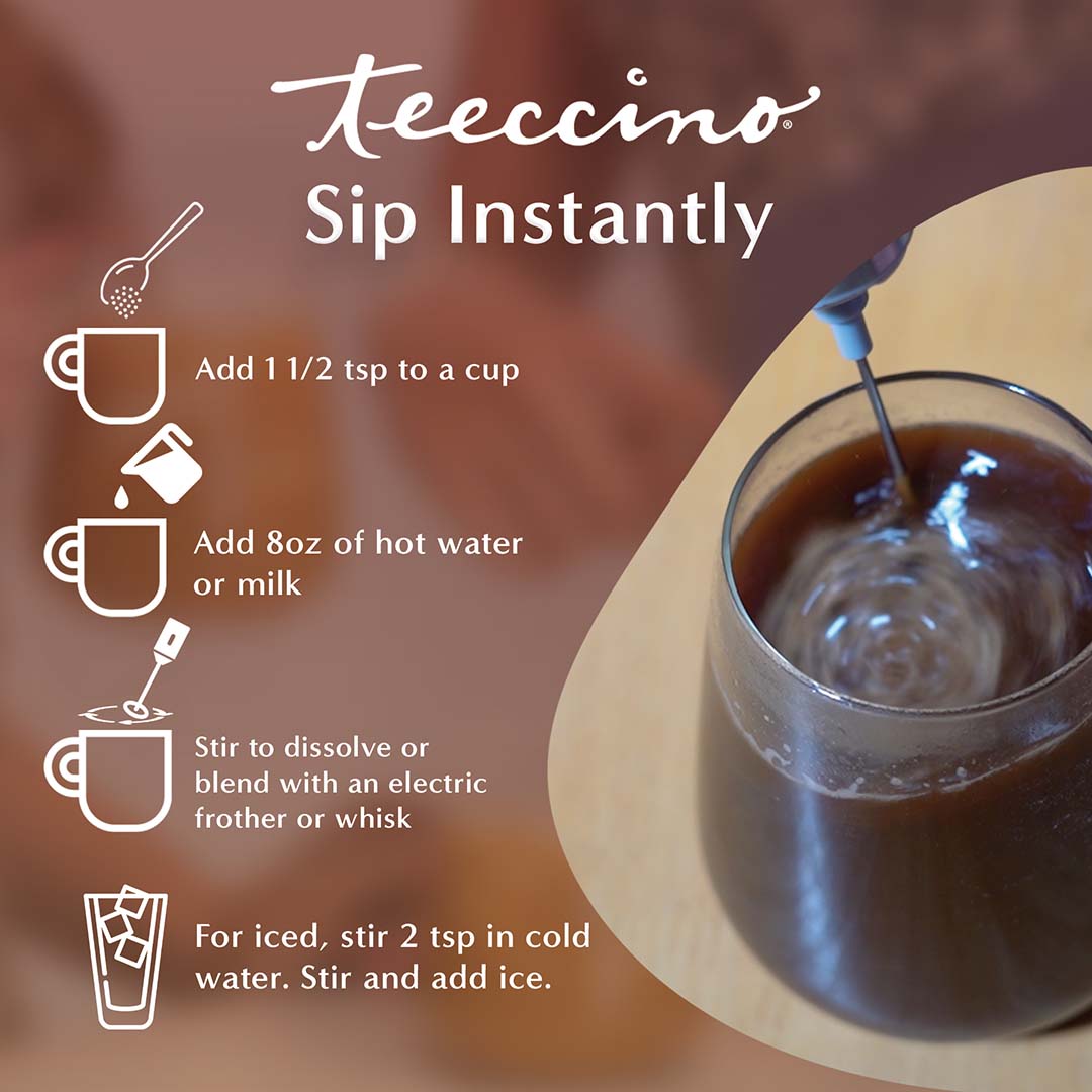 A single Monstera leaf in a clear glass vase against a white background.