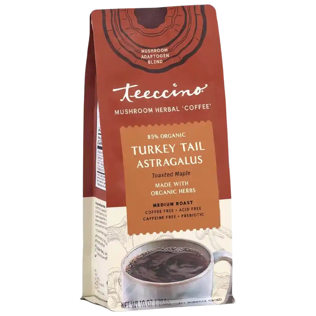 A single green leaf against a white background.