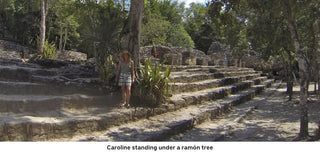 Caroline standing under a ramon tree