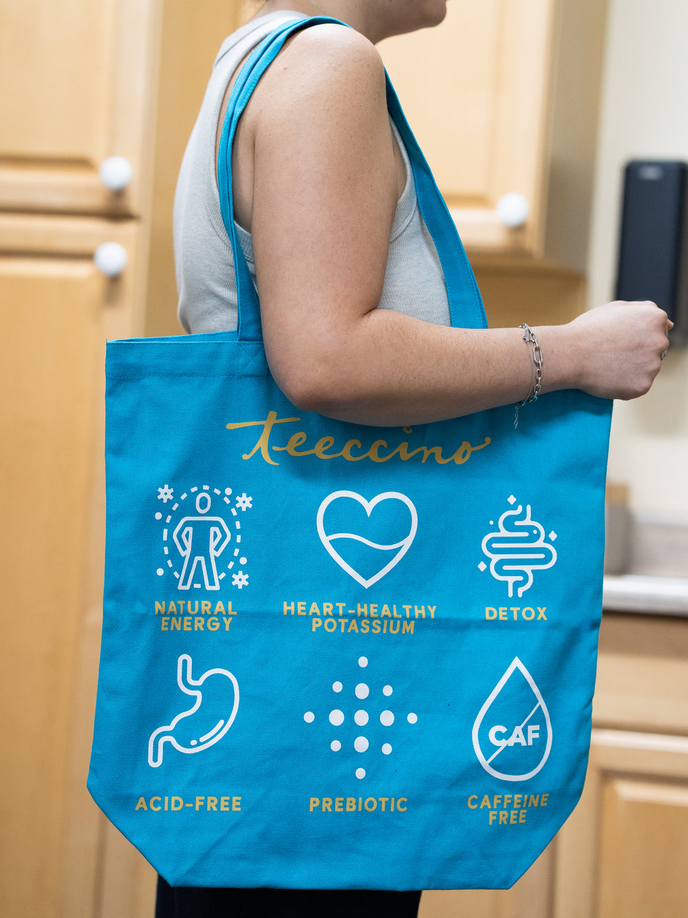 Teeccino Dandelion tote bag lifestyle, back view