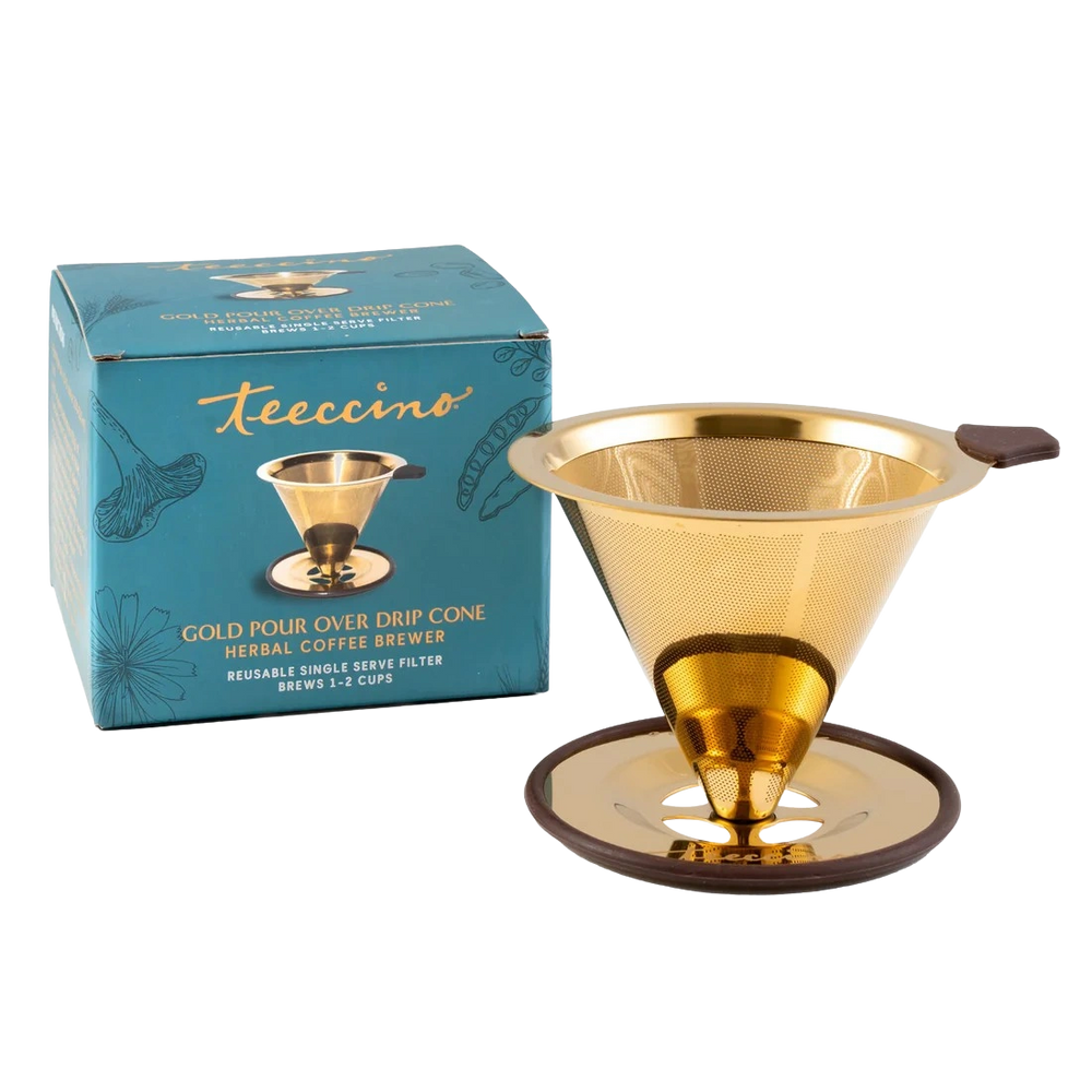 A gold pour over drip cone herbal coffee brewer is displayed beside its teal Teeccino product box on a transparent background. The reusable metal cone features a fine mesh filter, wide rim, and circular base designed for single-serve brewing. The box highlights “Gold Pour Over Drip Cone,” indicating it brews one to two cups and is intended for herbal coffee use.