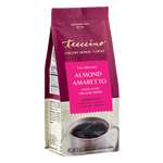 Teeccino Organic Almond Amaretto chicory herbal coffee in a pink and cream resealable bag, caffeine-free coffee alternative made with organic herbs.